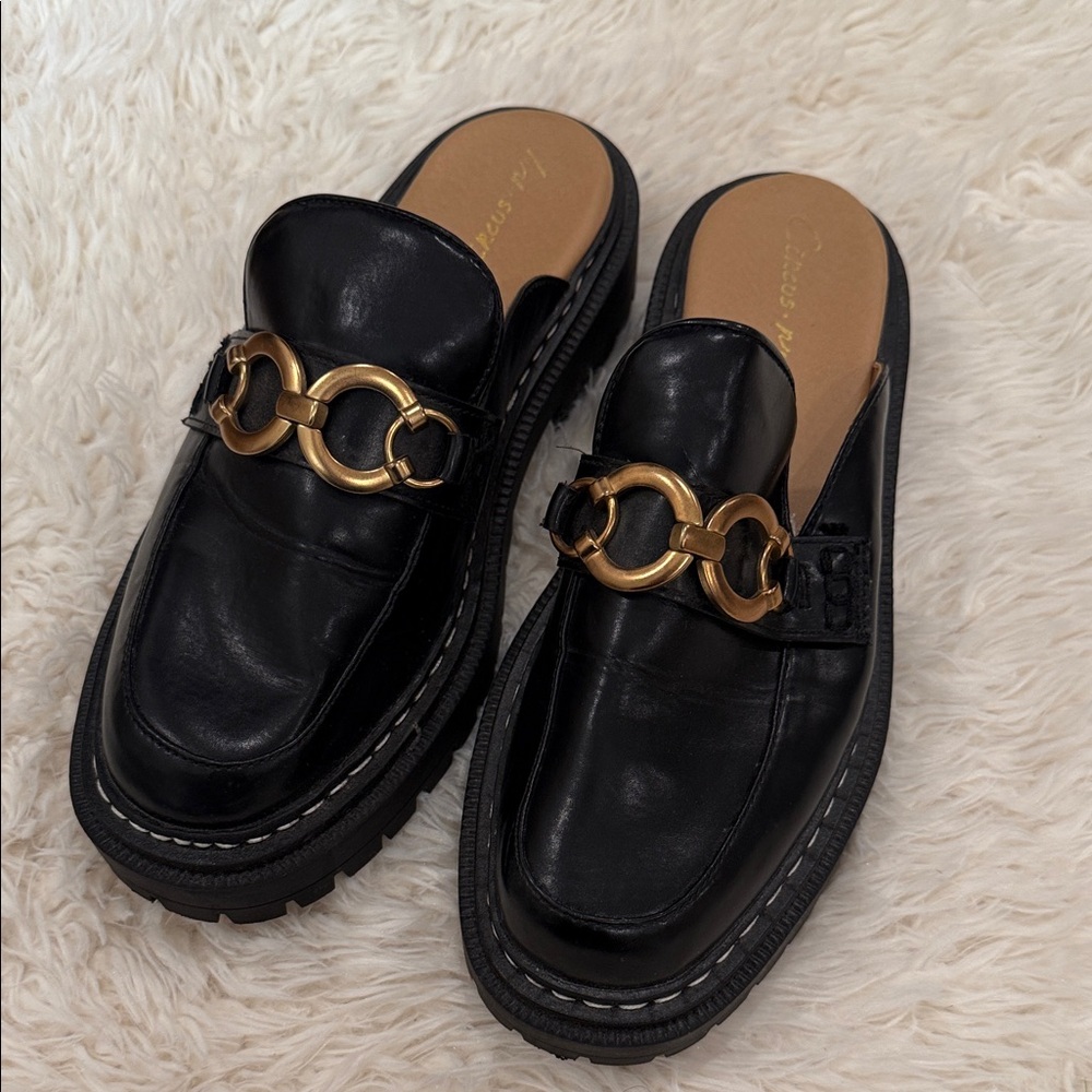Elegant Black Leather Loafers with Gold Accents